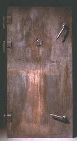 USHMM replica displayed as gas chamber door