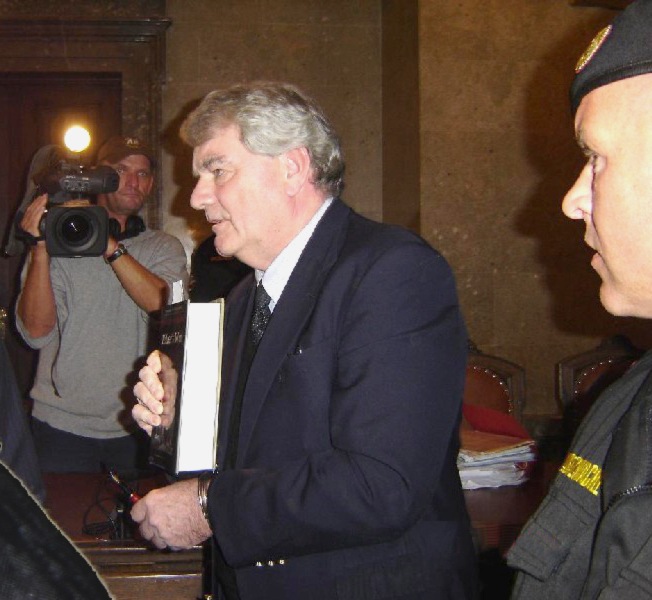 David Irving shackled by Austrian police
