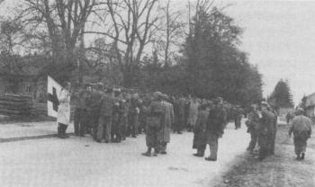 American soldiers summarily kill 520 of the 560 German camp personnel at Dachau