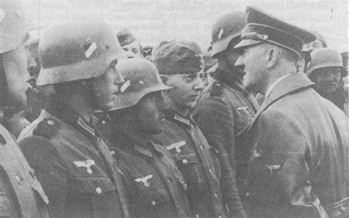 Hitler talking to German soldiers at the estern front