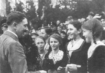 Adolf Hitler greeted by girls in Berchtesgaden