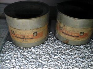 Old Zyklon-B cans with gypsum pellets