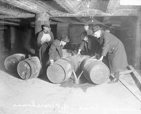 Prohibition agents destroy liquor barrels