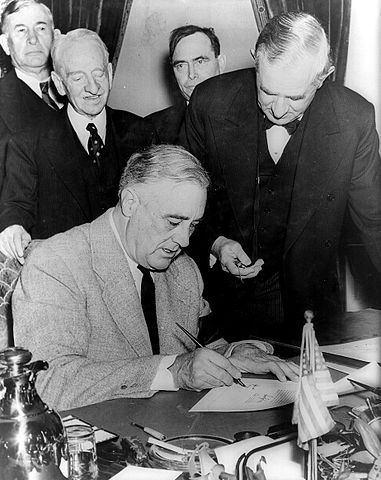 Roosevelt signs declaration of war